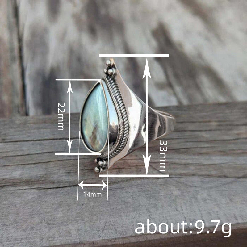 Ring With Teardrop Sticker To Resemble Natural Stone