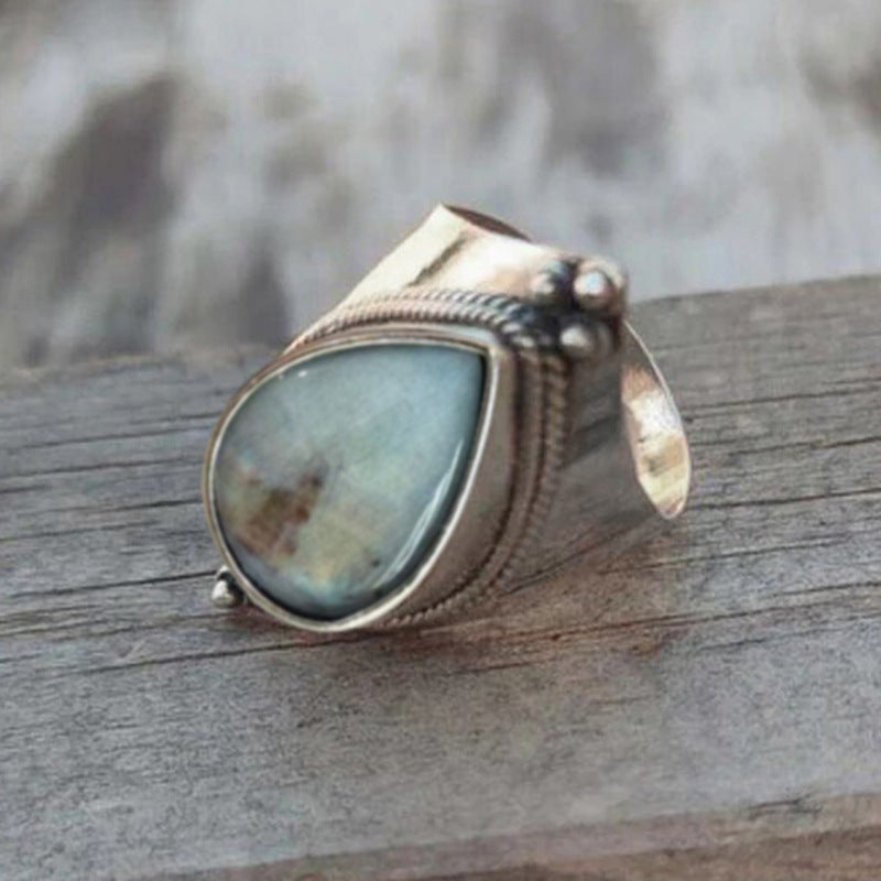 Ring With Teardrop Sticker To Resemble Natural Stone